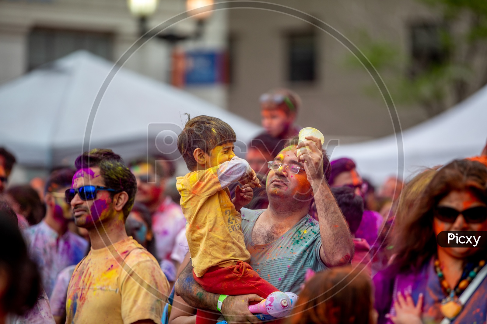 An Indian  Father And Son In Holi celebrations