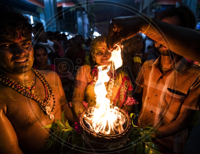 Hindu Devotees performing the Holy Custom