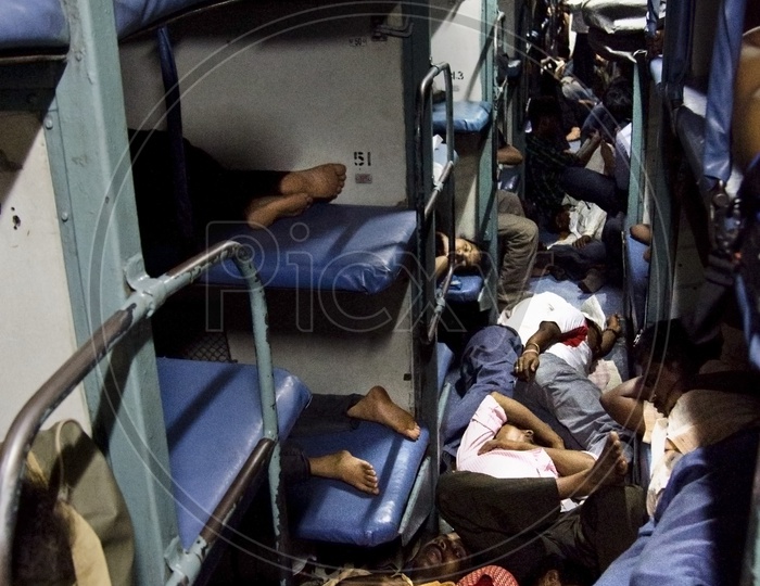 Passengers sleeping congested in a Train