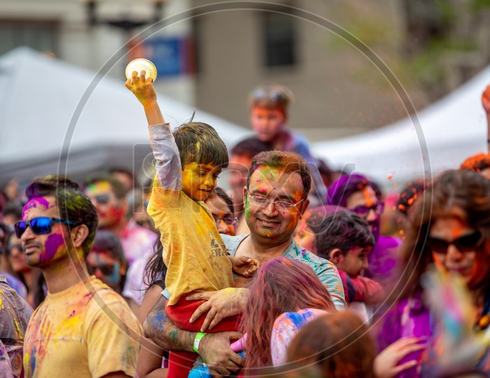 An Indian  Father And Son In Holi celebrations