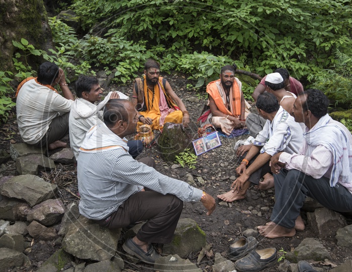 Indian Pilgrims / Devotees  Consulting  a Sadhu / Baba in Nasik