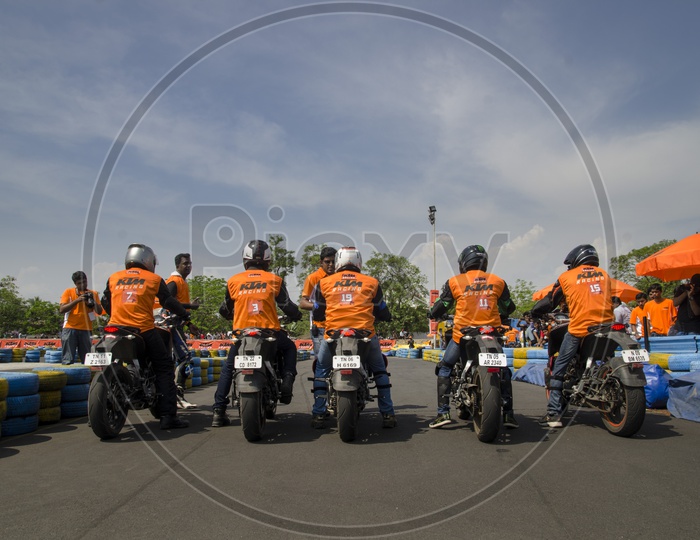 Bike Riders in Orange Day KTM Event in Chennai