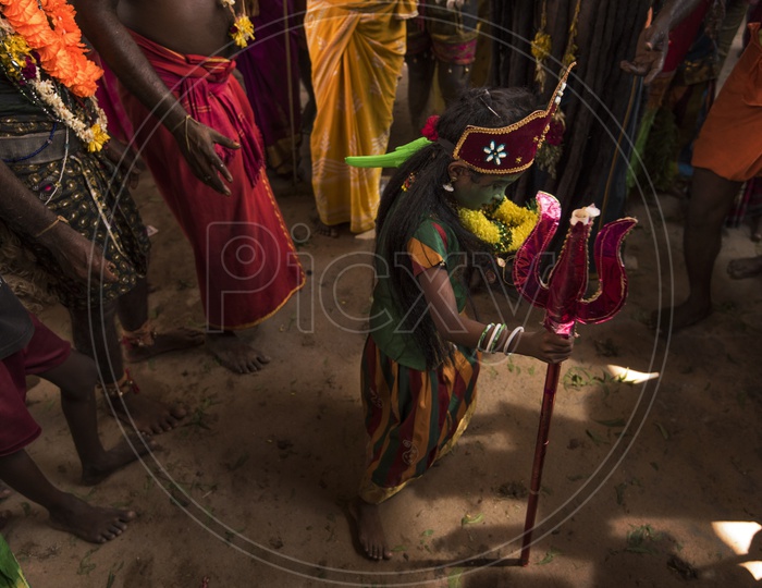 A Small Child in a Getup For Dussera Celebrations in tamil Nadu