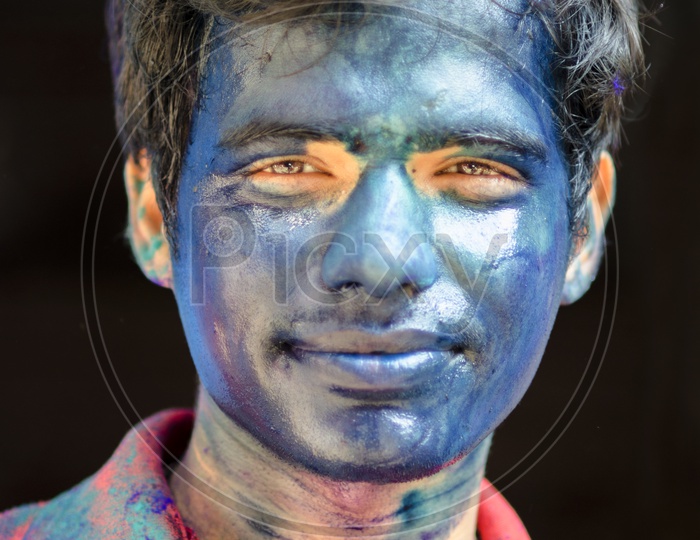 Portrait of a Indian men with colored face/ Happy Face