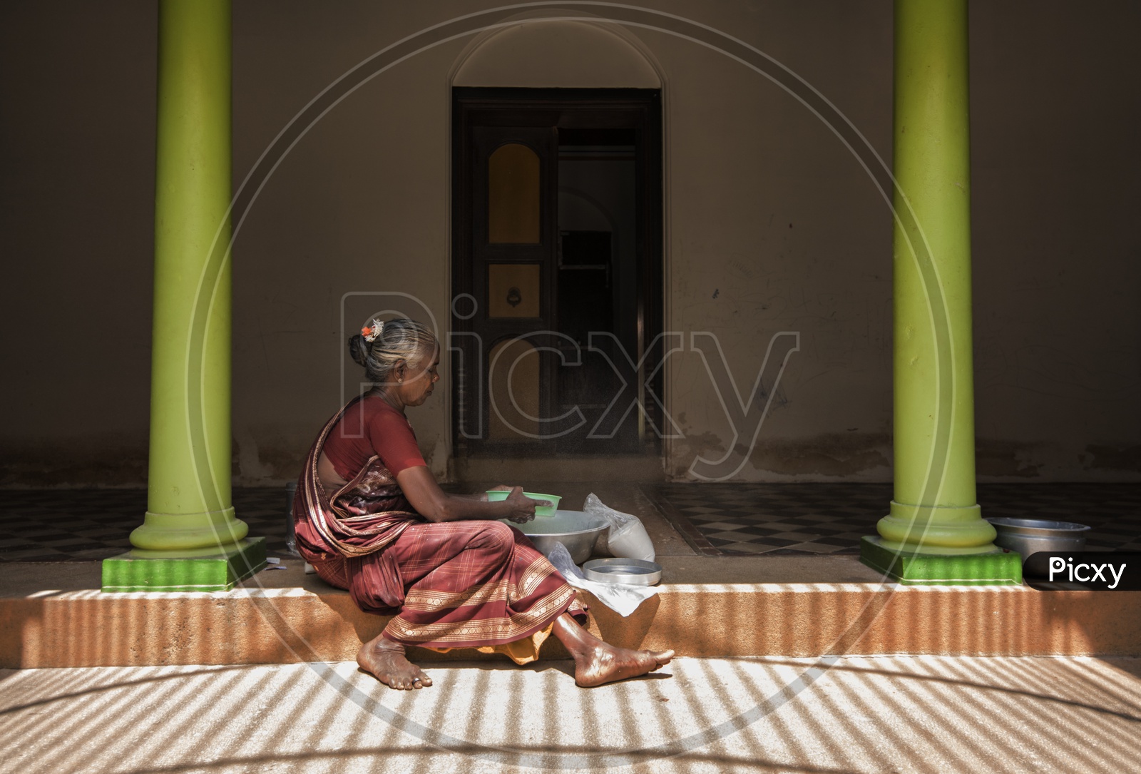 An Old Woman Doing household Works in Tamil Nadu