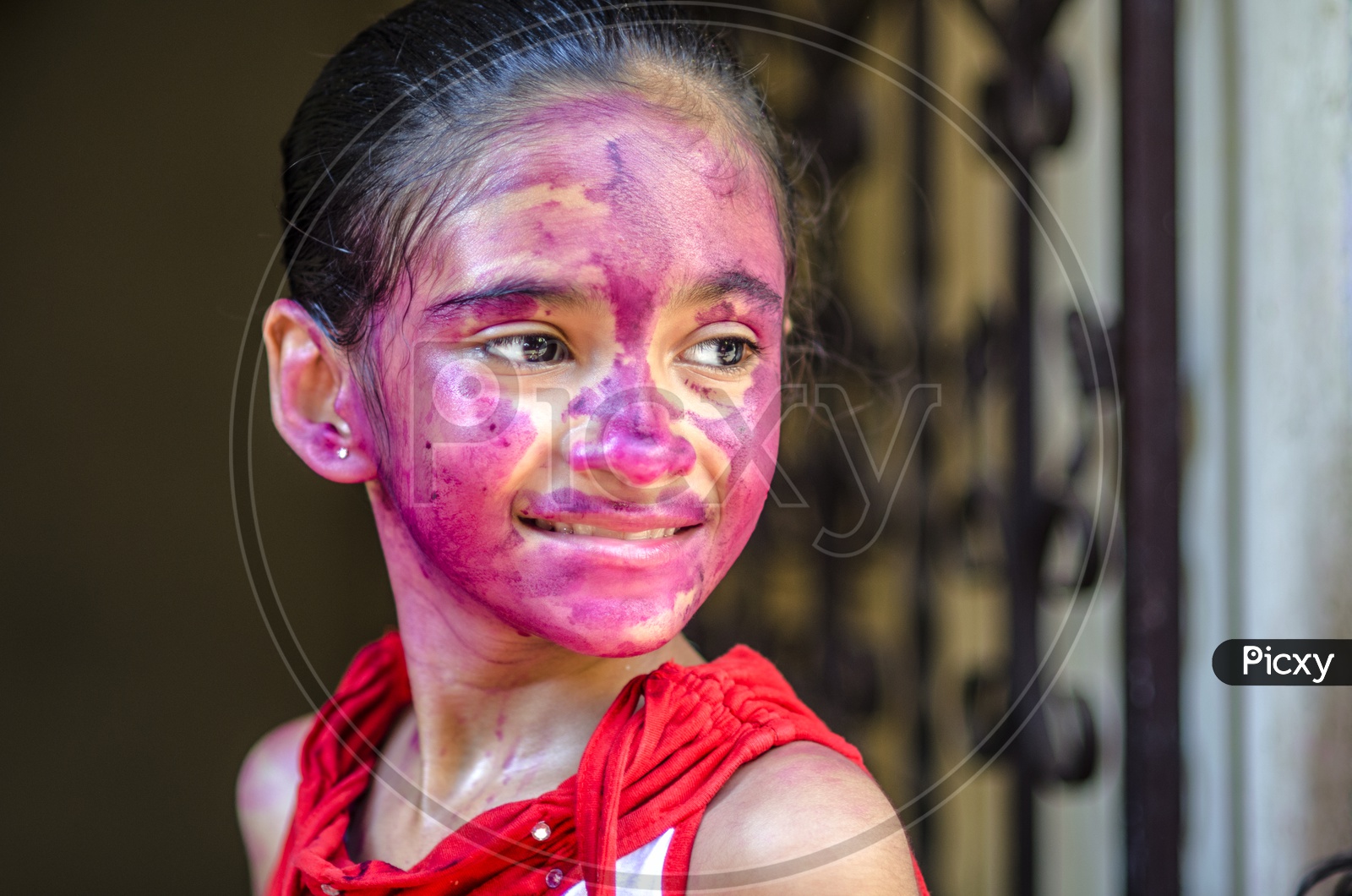 Portrait of a kid with colored face/ Happy Face