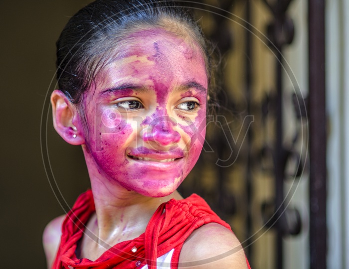 Portrait of a kid with colored face/ Happy Face