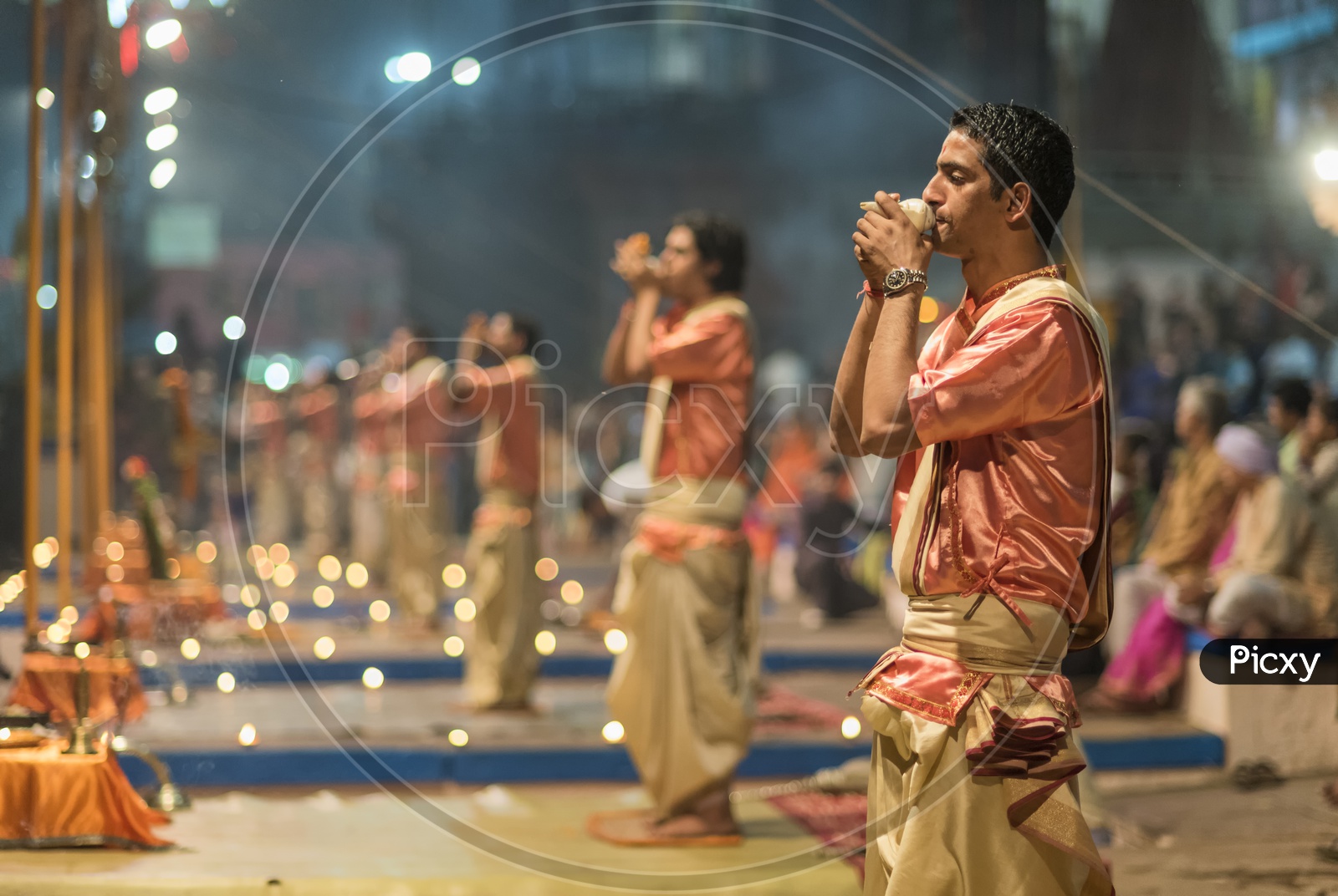 Priests Performing The Holy Aarti / harathi For River ganga in varanasi