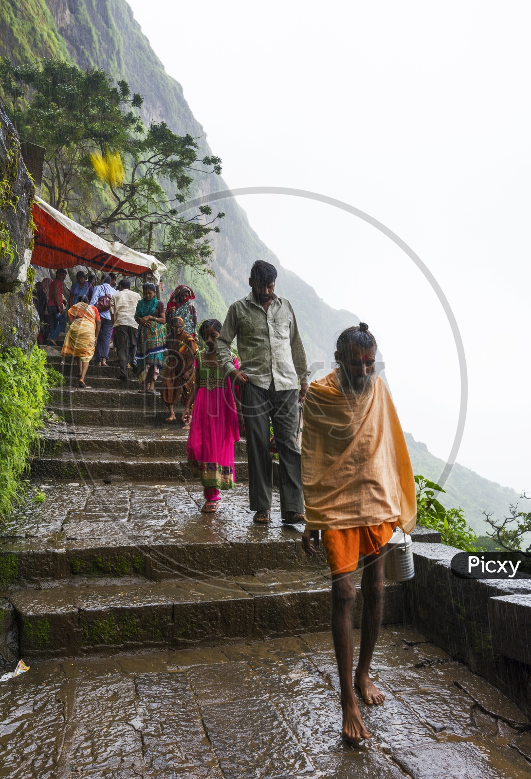 Pilgrims Coming From hill top temple in Nasik