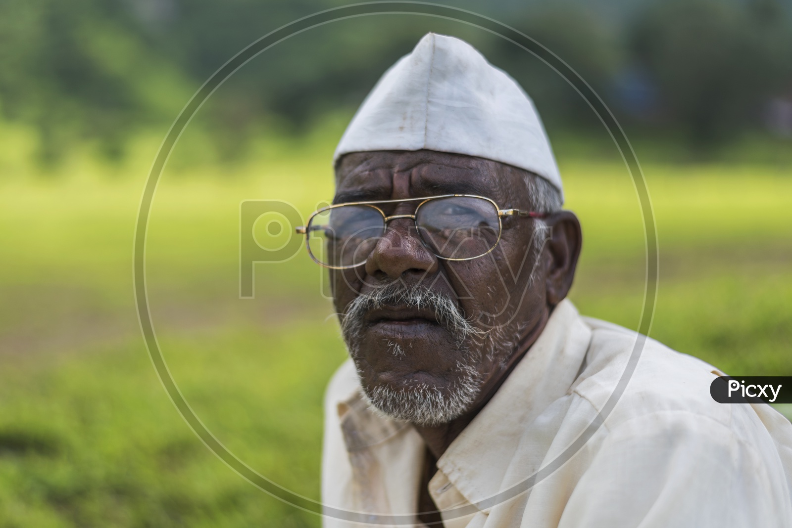 Portrait Of an Maharastrian Man wearing White Cap