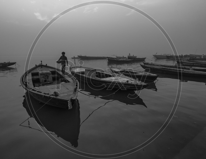 Kid standing on Boat in Varanasi