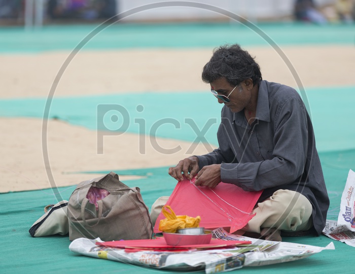 A Kite maker Preparing Kites In india