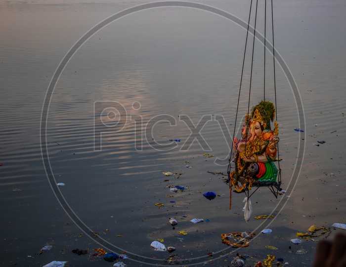 Ganesh Idols Being Immersed In Water During Ganesh Visarjan at Tankbund , Hyderabad
