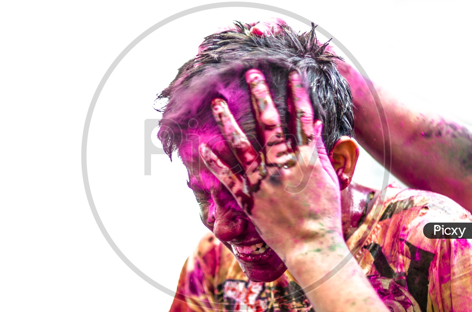 People celebrating  Holi festival in chennai / People with coloured face