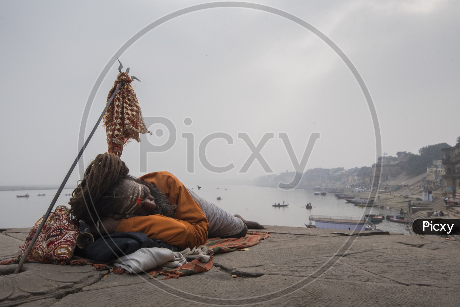 Sadhu sleeping on the Bank of River Ganga