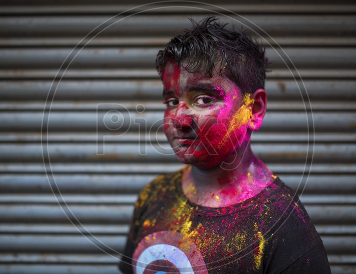 Kid with Colors on face - Holi Celebrations - Indian Festival - Colors/Colorful