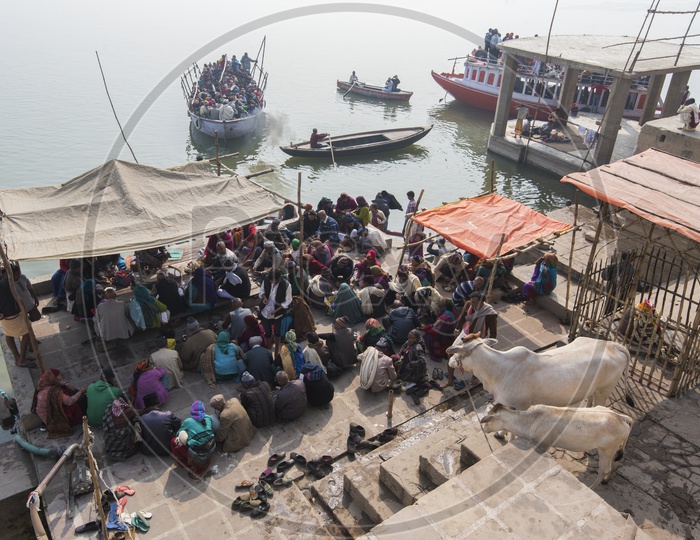 Passengers Waiting at the river bank for the Sailing Boats in Varanasi