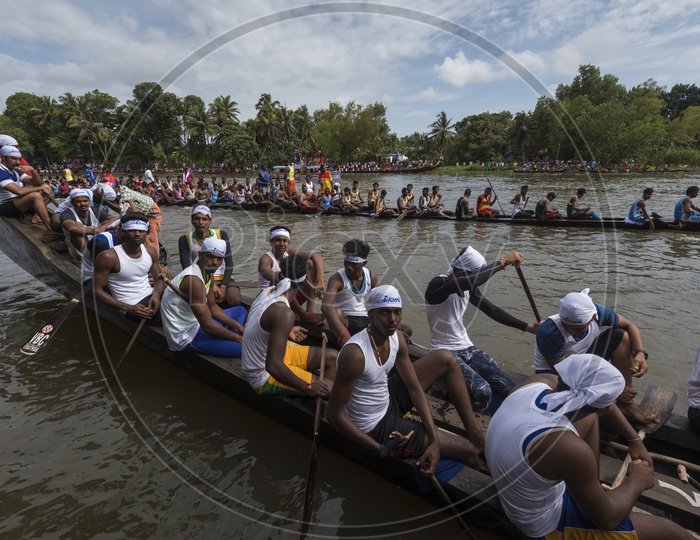 Oarsmen Rowing boats In Boat race Kerala