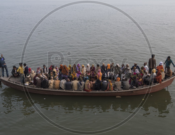 People traveling in a Boat in Ganga River in Varanasi