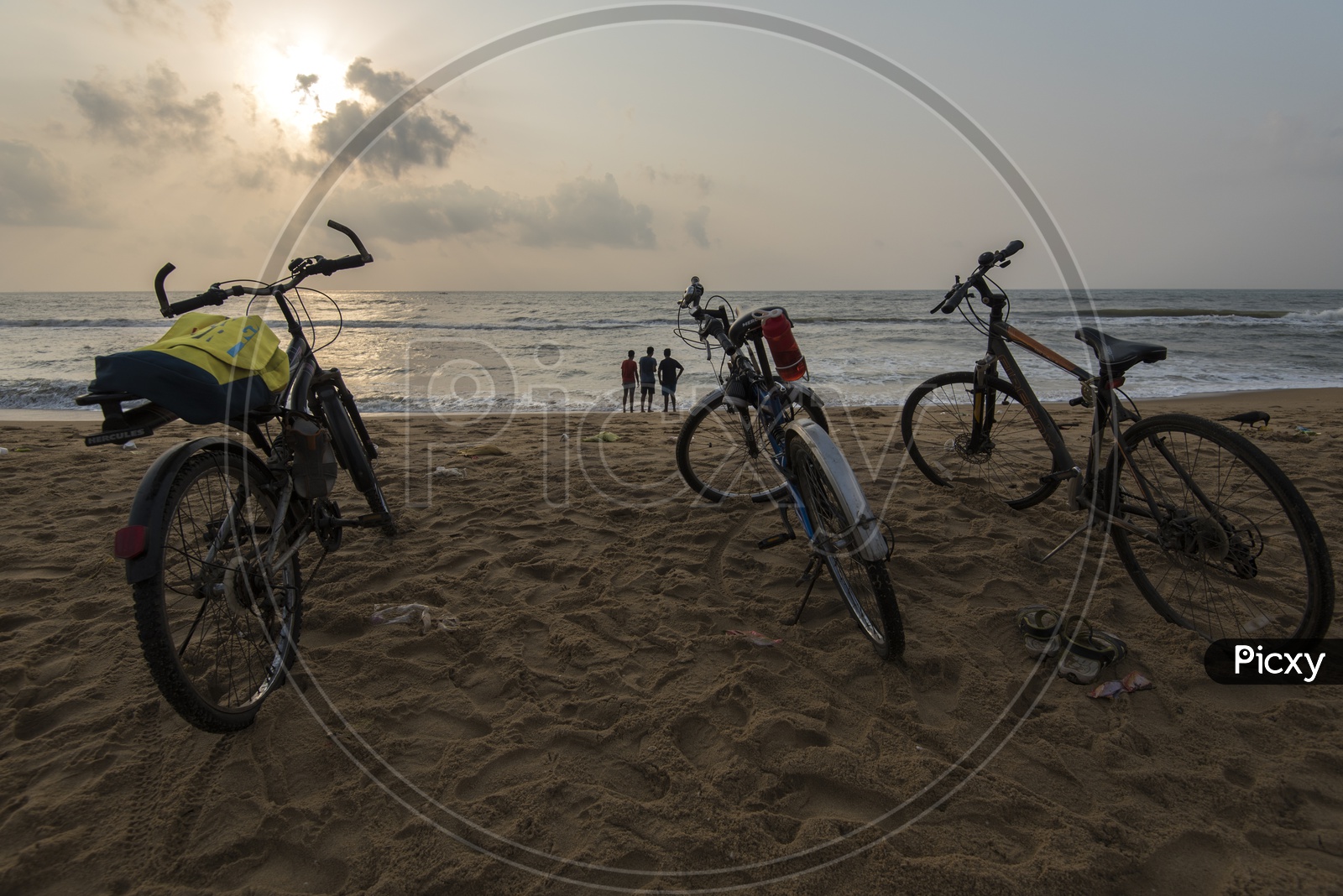 Bicycles at Marina Beach over a Sunrise