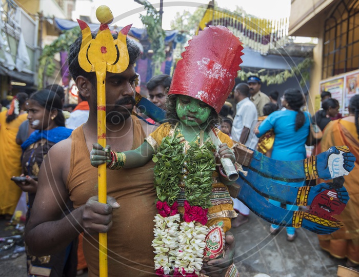 A Small Child in Godess Durga Matha Getup in Dussera Celebrations in Tamil Nadu