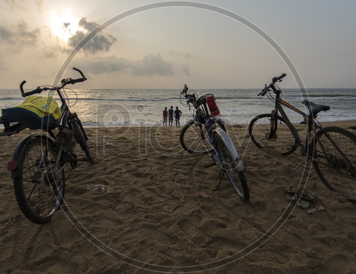 Bicycles at Marina Beach over a Sunrise