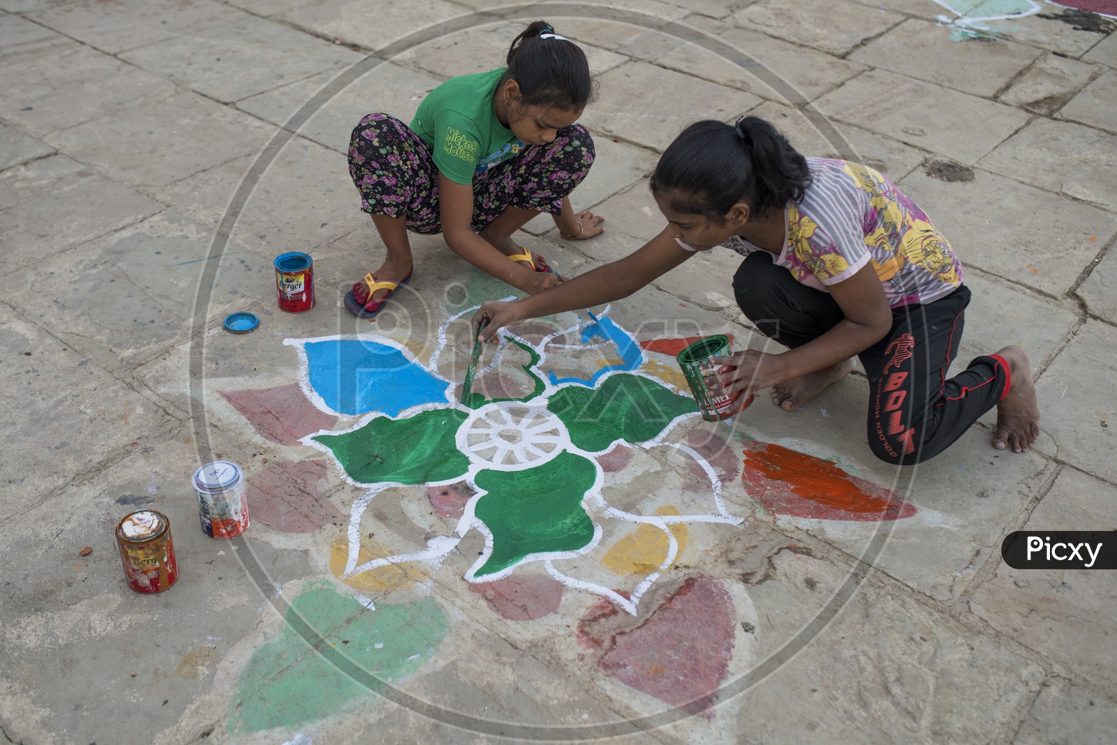 Kids decorating the ghats near their house for Dev Diwali.