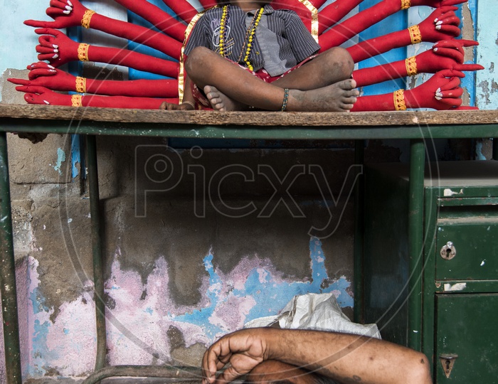 An indian Boy at a makeup area in kulasai With Properties