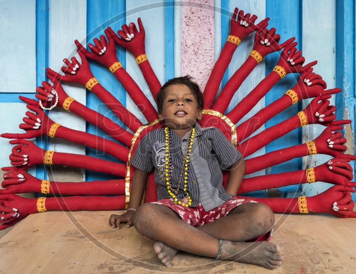 An indian Boy at a makeup area in kulasai With Properties