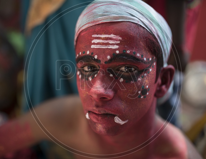 Indian hindu Devotee  Boy In a makeup Session For Dussera Celebration ritual in Tamil nadu