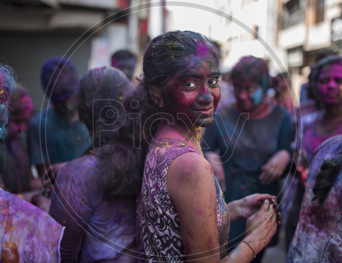 Kid with Colors on her face - Holi Celebrations - Indian Festival - Colors/Colorful