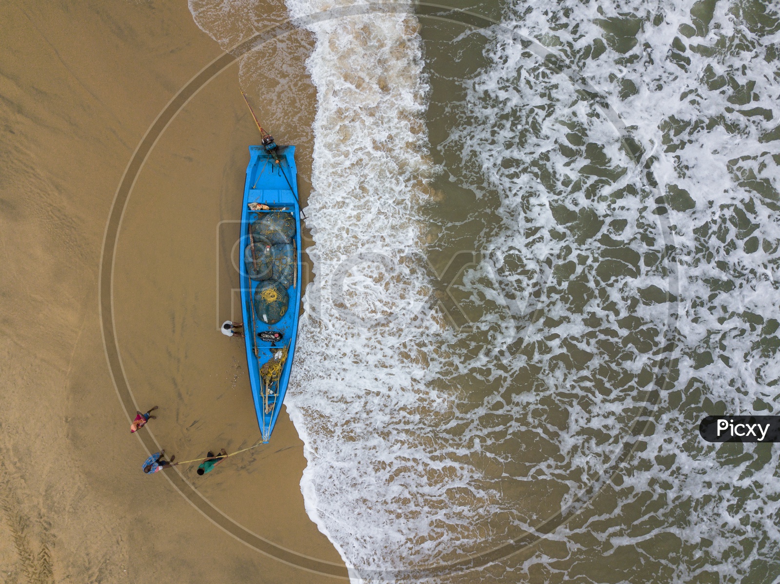 An Aerial View Of A  Fishing Boat in Beach