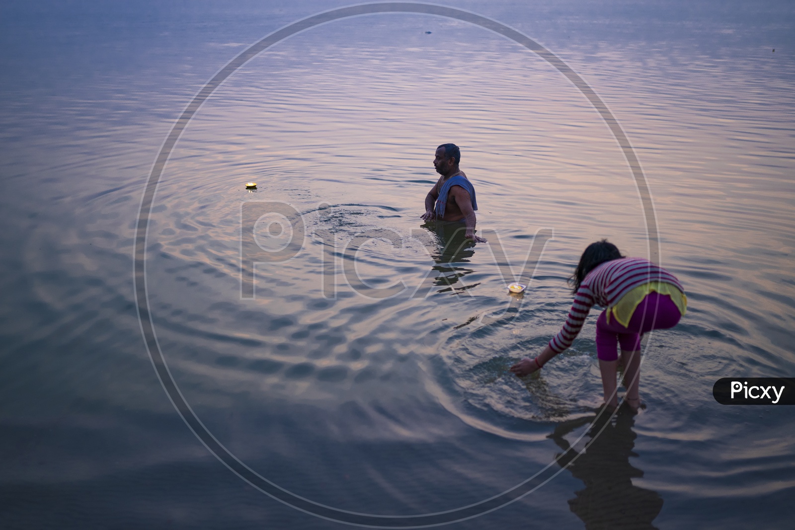 People leaving Diya in River Ganga as Tradition