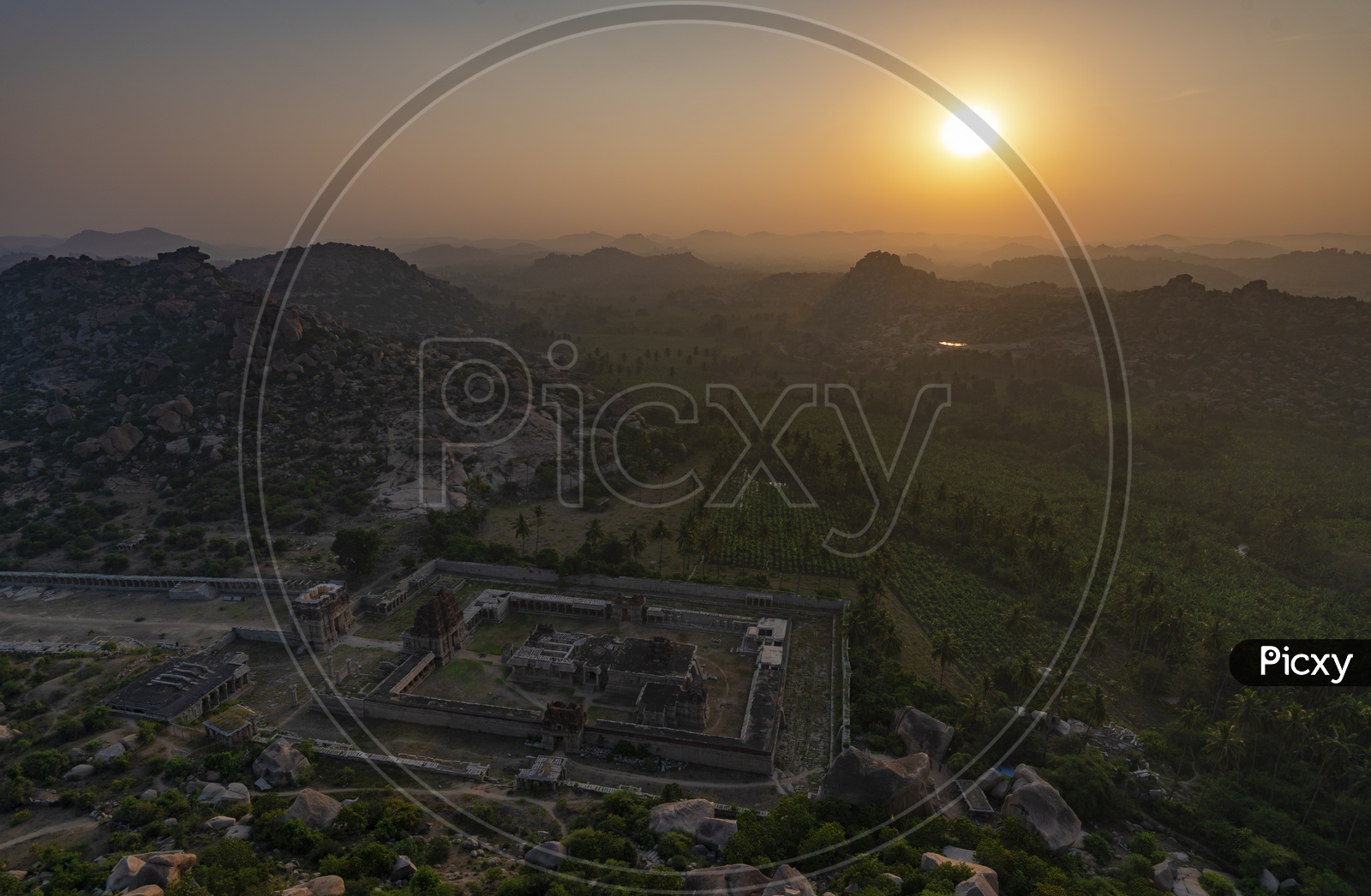 Achyuta Raya Temple in Aerial View with sunrise in the background