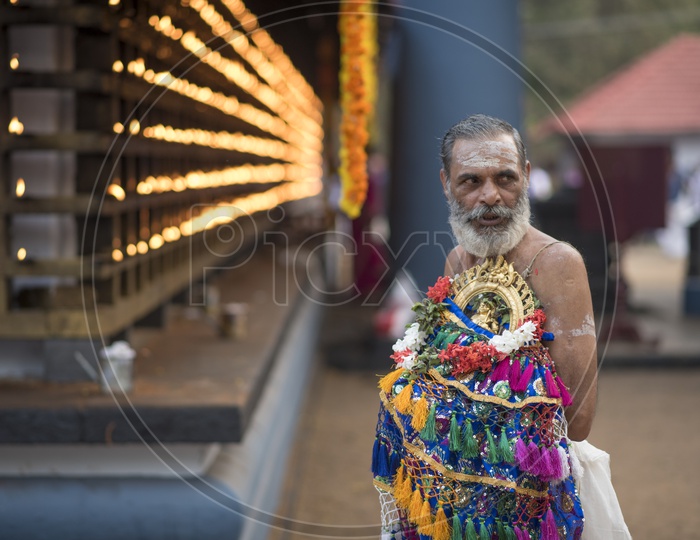 Hindu Priest in Arattupuzha Pooram Festival