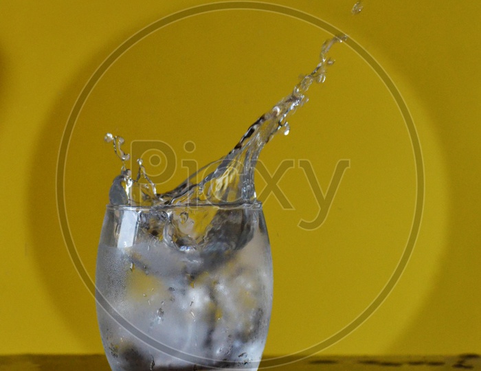 Splash of cold water in glass