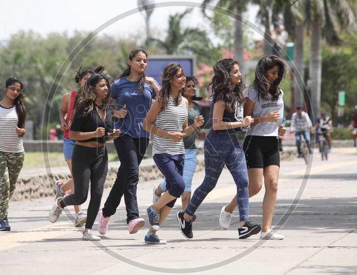 Young girls Jogging on Roads