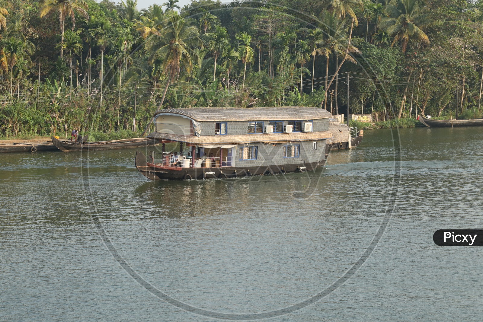 Boats sailing in water in kerala