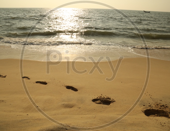 foot steps on beach sand