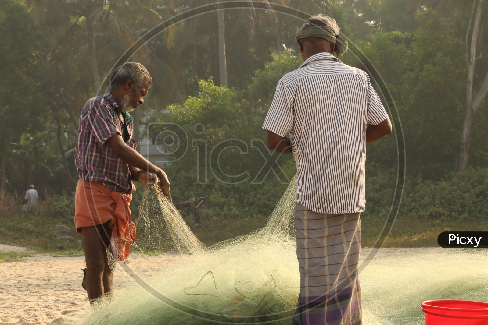 fishermen with fishing net