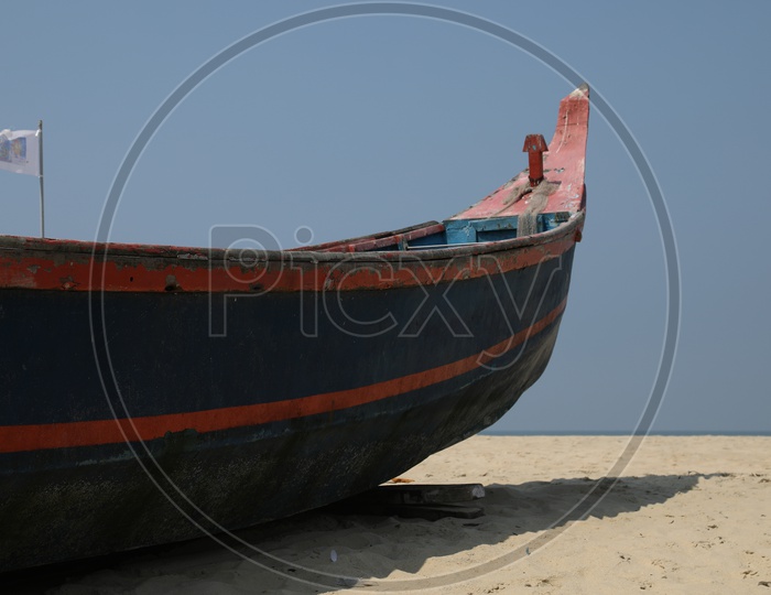boat rested on beach sand