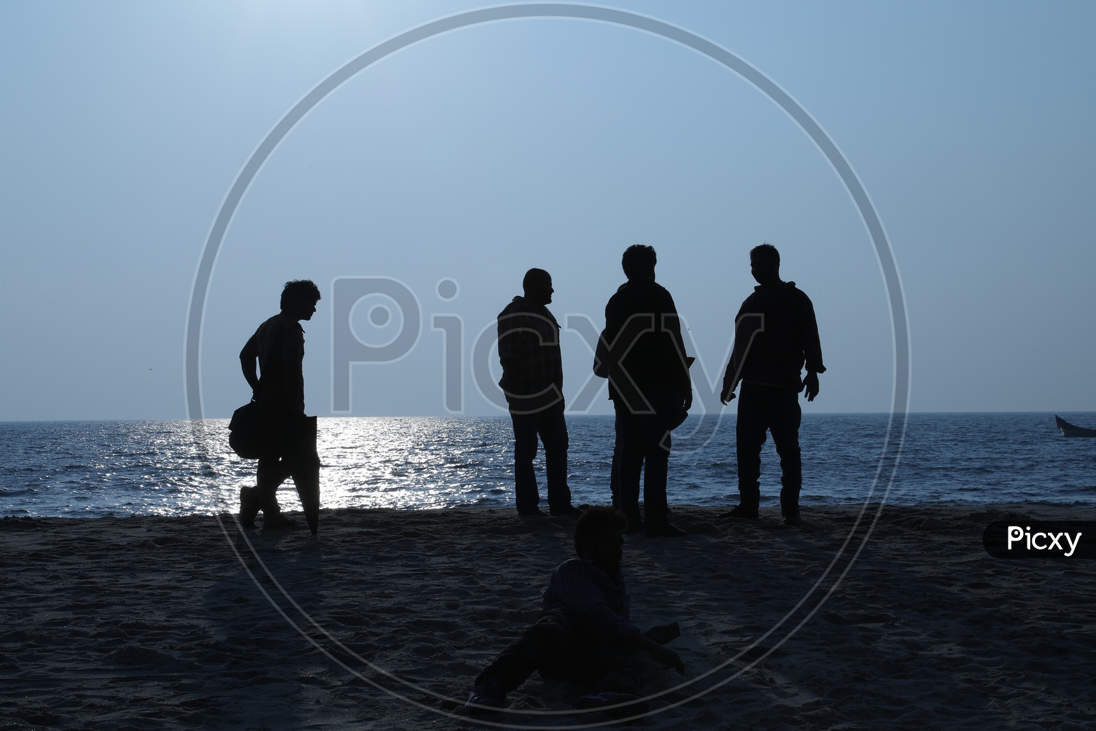 Silhouette of people at a beach