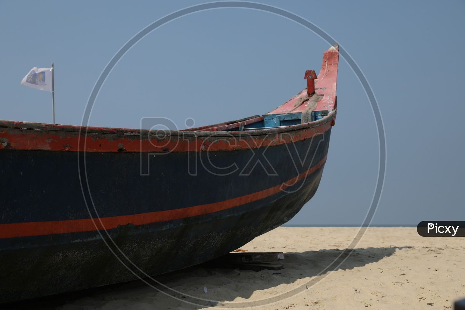 boat rested on beach sand