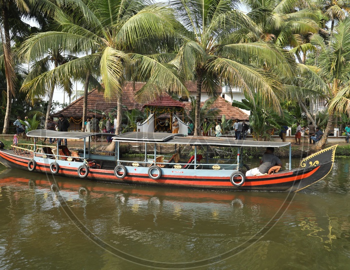 Boat sailing in local lake in Kerala