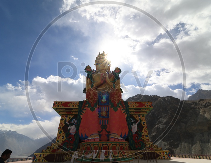 Beautiful Buddha Statue with Mountains of leh in Background