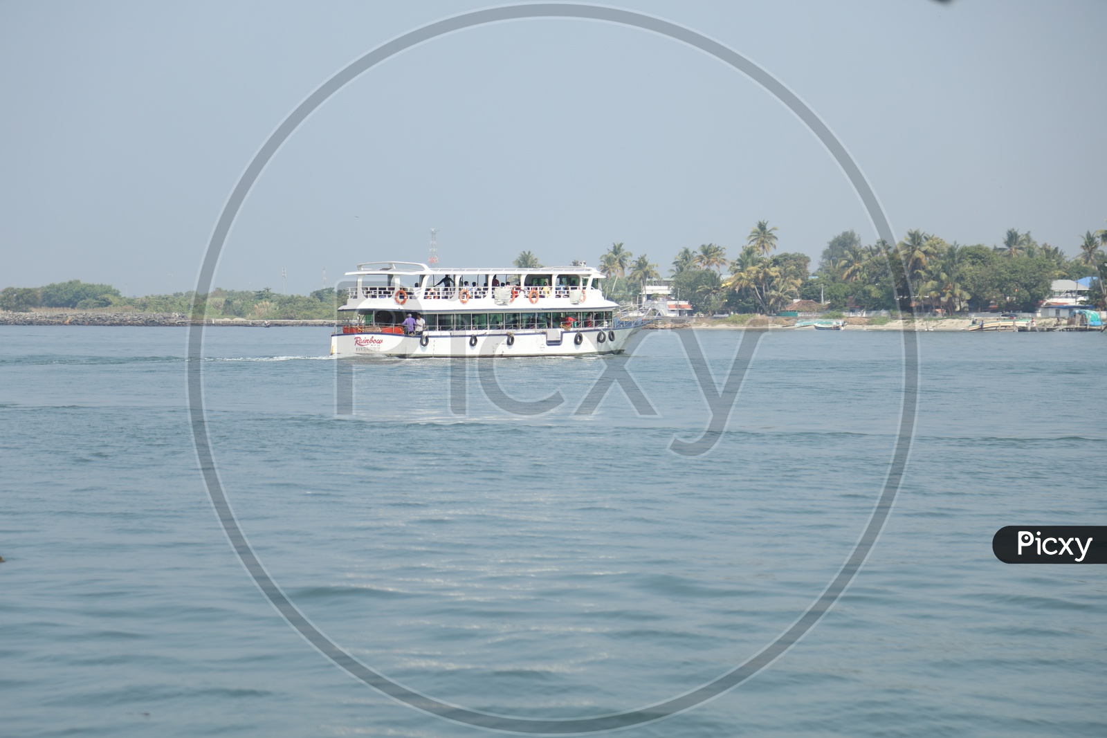 Boat sailing in water in kerala local river