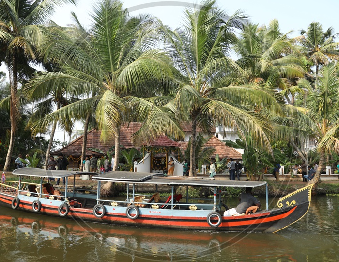 Boat sailing in local river in Kerala