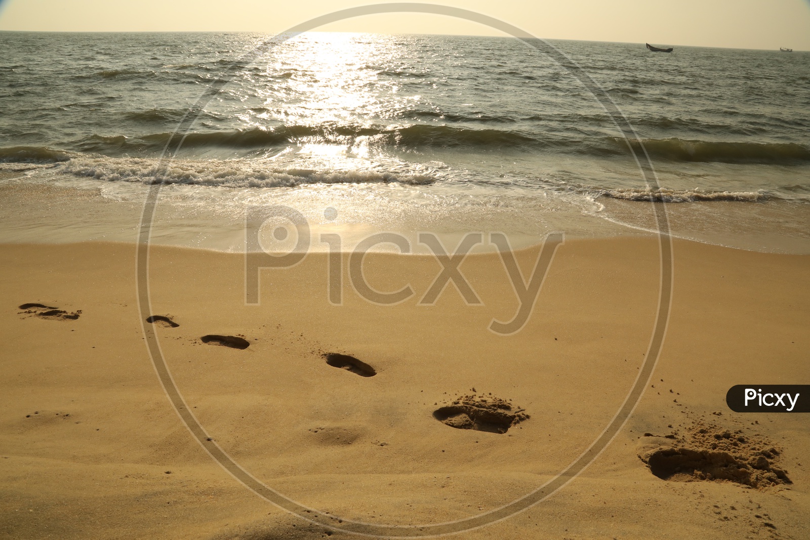 foot steps on beach sand