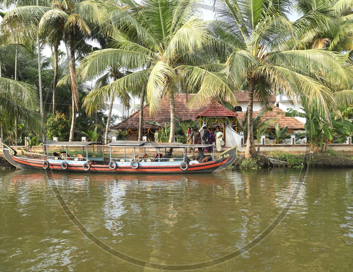 Boat sailing in local river in Kerala