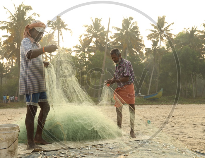 fishers with fishing net